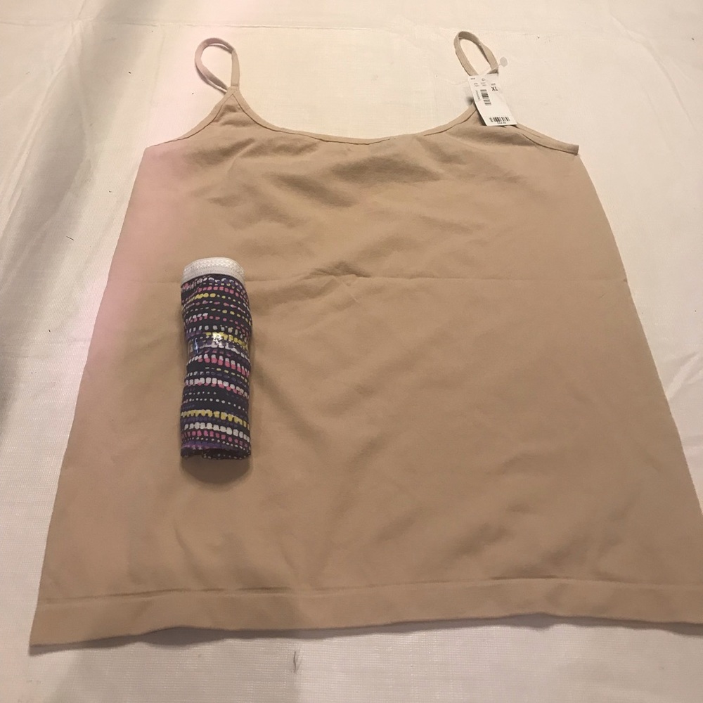 A brand new with tags nude color cami & panty